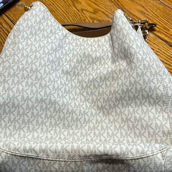 Michael Kors handbag. Vanilla color with tan straps and gold hardware. - Picture 1 of 16